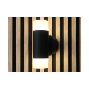 Sein&auml;valaisin SYKLO-KUPU 8W yl&ouml;s-alas 590lm 175x95x100mm, musta